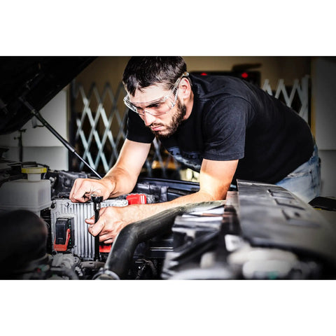 Man using Edge 155 Piece Master Mechanic's Tool Set with 72-Tooth Sealed Head Ratchet on car engine