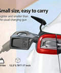 Straight Plug Play 2KW V2L Power Converter Adapter For Nacs Port attached to Subaru Solterra, showing compact size and design.