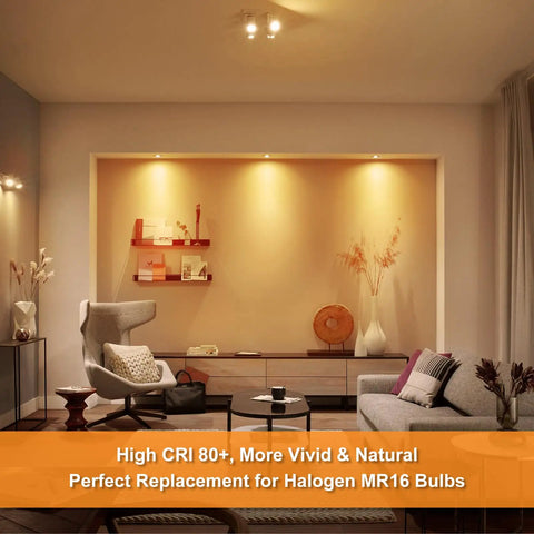 Cozy living room with 12 Pack MR16 LED Spotlight Bulbs Featuring GU5.3 Bi Pin Base, warm light illuminating gray couch.