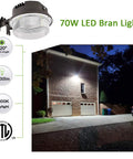 Beast 70W Barn Light With 9800 Lumen Output, 5000K Daylight Outdoor Flood Light illuminating garage at night
