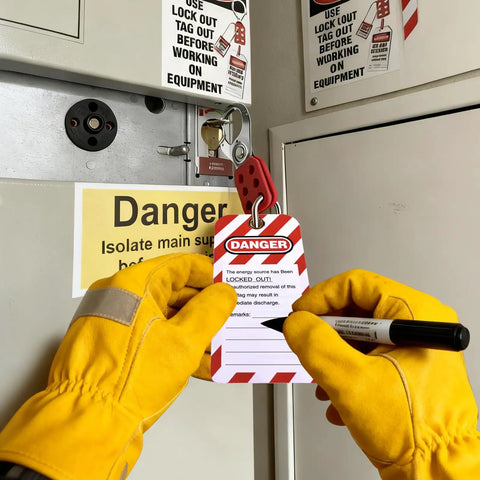 Person using the Lockout Tagout Station Kit With 6 Safety Padlocks, 2 Hasps, 2 Small Breaker Locks, 30 Loto Tags, 30 Nylon Ties, Wall Mounted Safety Box Ready To Roll For OSHA Compliance And Quick Lockout Setup on equipment panel.
