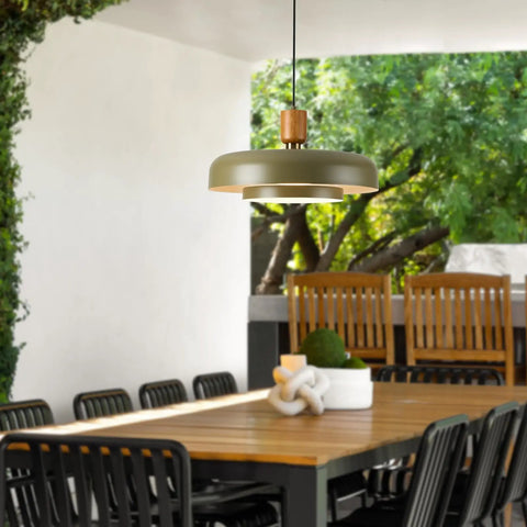 Mid Century Pendant Light 19 Inch Chandelier Featuring Bold Deep Green Shades Paired With Sleek Natural Wood And Polished Brass Accents in outdoor dining area.