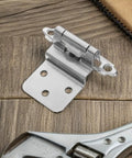 No Slam Soft Close Frameless Inset Cabinet Hinges 4 Pack Flush Mount Silver Iron on wood surface with wrench