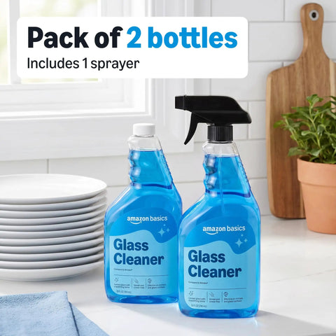 Pack of 2 bottles with sprayer, blue liquid, Streak Free Glass Cleaner For Mirrors And Windows, 32 Fl Oz Bottles, kitchen counter.