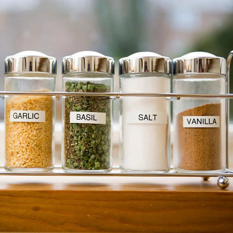 Compact Portable Label Maker Bundle Featuring Qwerty Keyboard Preview Display With Four Laminated Tape Rolls For Quick Home Office Organization Runs Totally Smooth Straight Up A Sweet Deal For Daily Grind And Quick Touch Ups used for labeling spice jars with garlic, basil, salt, and vanilla.