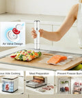 Compact Food Vacuum Sealer With 60KPa Power, Rechargeable Handheld Kitchen Saver used to seal fresh meat and veggies in bags.