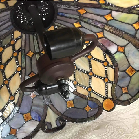 Close-up of Tiffany Style Stained Glass Ceiling Pendant Light With Baroque Vibe, showcasing handmade glass details, not lit.