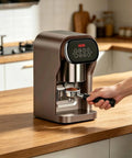 Robust 58 Mm Electric Coffee Tamper providing spot on ten to thirty kilogram pressure and adjusted timing sequences in bronze.