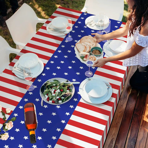 Patriotic Tablecloth Set Two Pack 54 By 108 Inch Disposable All American Flag Table Covers For Fourth Of July dining setup.