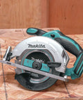 18V Cordless Circular Saw 6-1/2 Inch Tool Only With A Powerful 3,700 RPM Motor, aluminum base on wooden surface