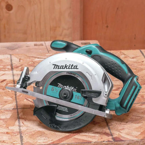 18V Cordless Circular Saw 6-1/2 Inch Tool Only With A Powerful 3,700 RPM Motor, aluminum base on wooden surface