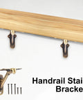 Rock Solid Handrail Stair Brackets For Staircases Heavy Duty Zinc Alloy Railing Supports with Screws Antique Brass Finish shown on wood.