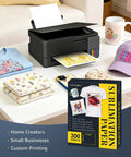 Heavyweight 125Gsm Sublimation Paper 8.5x11 Inch 300 Sheets for inkjet printers next to custom printed DIY projects on table