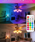 Lit Color Changing LED Light Bulbs 70W Equivalent A19 Base in RGBW mode, shown illuminating a room with color and warm white settings.