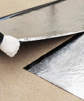 Premium Ultra Heavy Duty Self Adhesive Waterproof Roof Patch Tape For Asphalt Shingles And Leaks Hella Tough being applied.