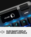 Top Tier Mechanical Gaming Keyboard Featuring Integrated OLED Display USB Passthrough Media Controls Heavy Duty Aluminum Housing Tactile Clicky Blue Switches Full Spectrum RGB Lighting For Gamers showing OLED smart display and volume controls.