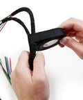 Person applying Temflex 1700 Vinyl Electrical Tape single roll 3/4 in x 60 ft Black PVC insulating tape on wires for splicing