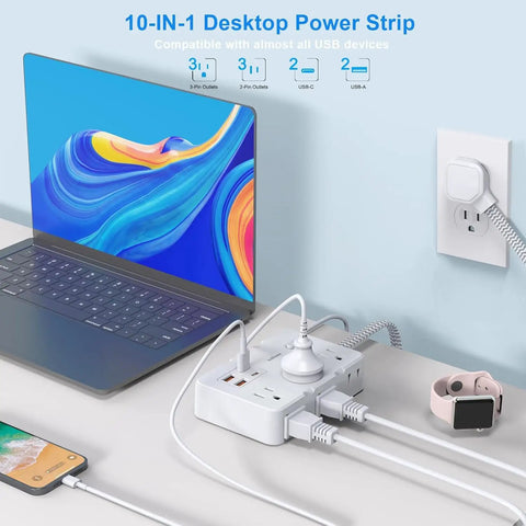Snag This Game Changing Surge Protector Power Strip With Ten Foot Braided Extension Cord And Six Wide Spaced AC Outlets Plus Dual USB Ports For Plugging All Your Gear Up At The Dorm Or Apartment connected to a laptop and phone on a desk.