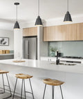 Top Tier Matte Black 3 Pack Pendant Lights For Kitchen Island Heavy Duty Metal Hanging Lamps with sleek design over wooden stools.