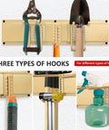Close-up of 33 Inch Wall Mounted Garage Tool Rack With 2 Panels And 6 Heavy Duty Hooks 675 Lb Capacity Adjustable Rails For Shovels And Yard Tools Durable Shed Organizer In Gold Finish, showing various hooks holding tools.