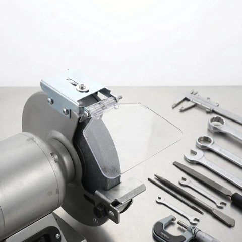 2 Pack Industrial Grinder Splash Guard With Bench Grinder Eye Shield Protector positioned on a metal grinder with tools.