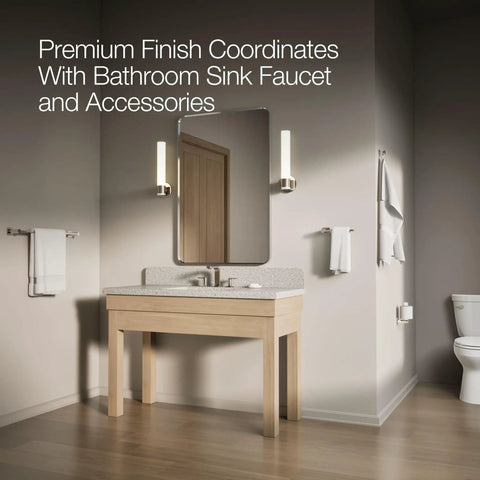 Bathroom with sink, mirror, and toilet featuring Cimarron Left Hand Trip Lever For Comfort Height Toilets In Vibrant Polished Nickel Finish.