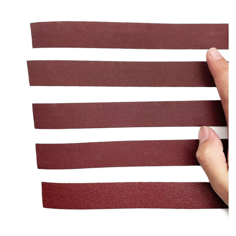 Premium 8 Meter Sandpaper Rolls For Smooth Woodworking And Metal Grinding, versatile emery cloth pieces being held.