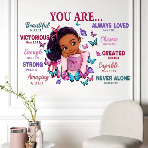 Dope Black Girl Religious Butterfly Wall Decal Sticker With Positive Saying You Are Beautiful For Nursery Decor And Afro Kids Room Vibe Inspirational Home Art Gift For Bedroom And Playroom displayed on wall above chair