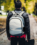 Minimal Mountain Lake Art Backpack For Everyday Carry Unisex shown outdoors on person wearing black jacket