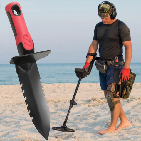 Heavy Duty Metal Detecting Shovel With Carry Sheath Dual Serrated Edge Digging Tool on sand with person metal detecting nearby