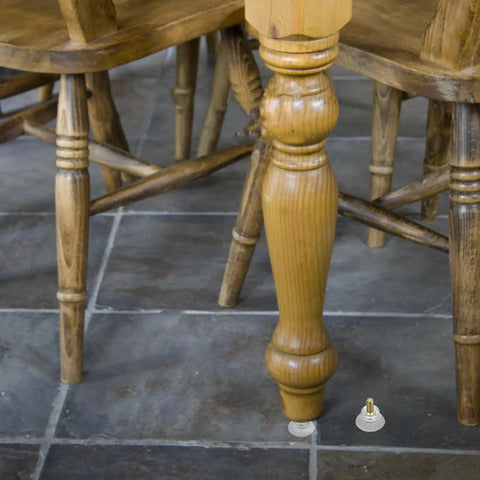 Ten Piece Screw On Glide Set With Suction Cups That Keep Your Sofas And Tables Stay Put, non slip floor protectors in use