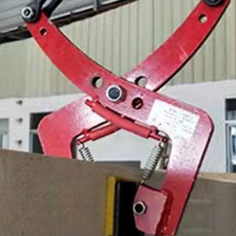 Built Tough Universal Granite Slab Lifting Clamp gripping a granite slab with red alloy steel jaws for easy transport.