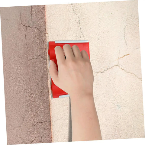 Hand using Two Pack Paint Edger Pad Refills For Deck Stain And Wall Painting Easy Swap Replacement Pads on wall