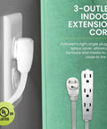 Badass 16 By 3 SJT Extension Cord 8 Foot Heavy Duty Workhorse with snap fit 3 outlets near a wall with ultra thin flush socket.