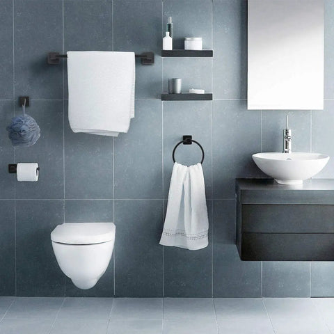 Matte Black 4 Piece Bathroom Hardware Set With 17 Inch Towel Bar, Towel Ring, Toilet Paper Holder And Wall Hook installed in modern bathroom