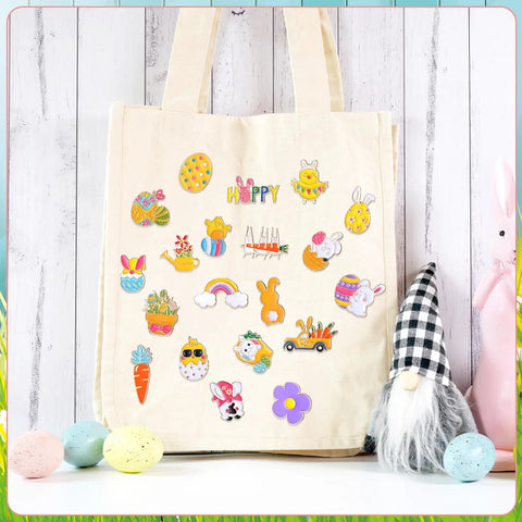 Grab These Fresh Forty Piece Easter Enamel Pins Bulk Collection featuring spring brooches on a beige tote bag with bunny egg designs.