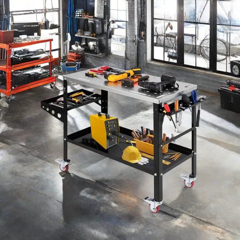 Welding Table 36 By 18 Inch With Wheels, 1200 Lbs Capacity, 8 Tool Slots, Five Eighth Inch Fixture Holes, in workshop setting.