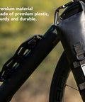 Close-up of front fork cage for mountain bikes, solid plastic bottle mount with easy installation, on bike frame.