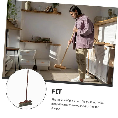 Long Handle Heavy Duty Broom With Soft Beveled Bristles For No Sweat Dust Removal And Quick Corner Cleanup Solid Workhorse Crushes Daily Kitchen Grime Indoors Or Outside Smooth Operator Approved; man using broom in kitchen to sweep dust