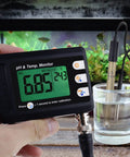 2 In 1 pH And Temperature Meter With ATC Dual Display Water Quality Tester for Hydroponics in hand with probe in water