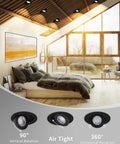 Slick 12 Pack 4 Inch Black Gimbal Led Recessed Lights 5Cct Canless Downlights mounted in a modern bedroom with wooden accents.