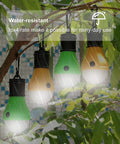 Portable LED Camping Lantern With Clip Hook Waterproof Battery Powered Emergency Light Lit Bright With 3 Modes For Hiking Camping Fishing Power Outage Or Party Black 4 Pack hanging on tree in rain