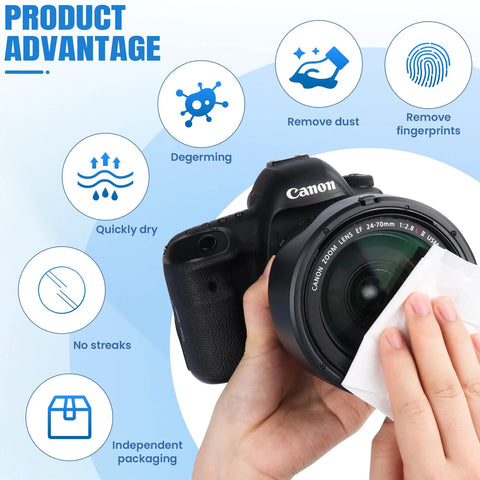 Lens cleaning wipes being used on a Canon camera lens; hand holding a white wipe