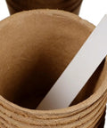 Breathable Paper Pulp Nursery Pots For Seedlings And Direct Planting, brown pot close-up with white label, ideal for gardens