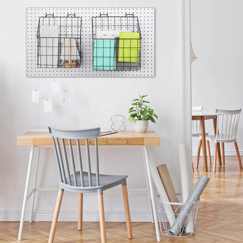 Two Pegboard Baskets Set With Hooks Large 12.4x7.5x12.8 Inches And Medium 11x5x12.6 Inches Includes Four 2 Inch Hooks For Garage Or Workshop Organization Black mounted on a wall with office supplies.