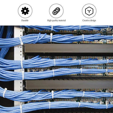 Two Rolls Of Black Reusable Self Gripping Cable Ties For Smooth Cord Organization Ditch Those Flimsy Snap Ties And Get Your Desk Back In Shape With These Heavy Duty Loop Wire Straps arranged with blue cables.