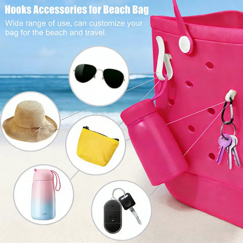 6 Piece Waterproof Beach Bag Organizer Kit For XL Totes with hooks and accessories attached to a pink tote on a beach.