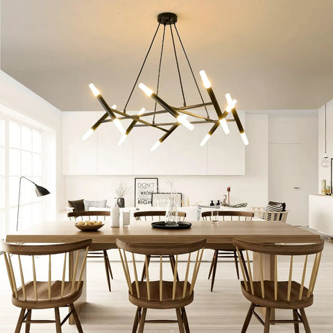 Modern Dope Pendant Lighting Black Linear Chandelier Hanging Light Fixture in dining room with matte black metal arms and bulbs.