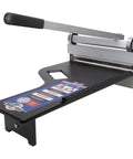 Ultra Lite Flooring Cutter For Vinyl Plank, Laminate, Engineered Hardwood And Siding Made In The USA Cuts Vinyl And Laminate Up To 15/32 Inch And Engineered Wood Up To 3/8 Inch Honing Stone Included Lightweight Pro Grade Tool with black base and handle.