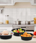 Meal Prep Containers With Lids 50 Pack 32 Ounce Round To Go Food Storage Bowls with salad and pasta in a kitchen setting